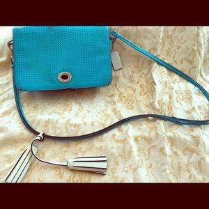 Coach crossbody, perforated blue with white tasel